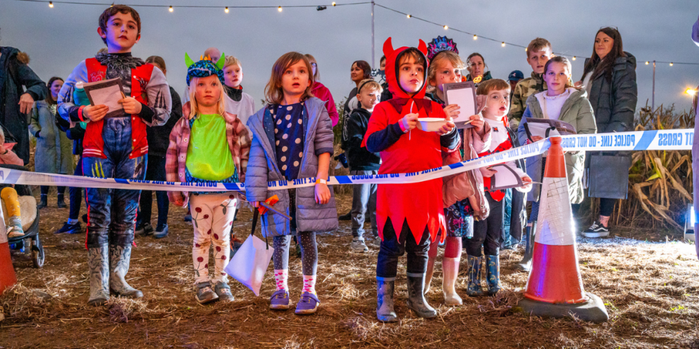 children watching trick or treat street